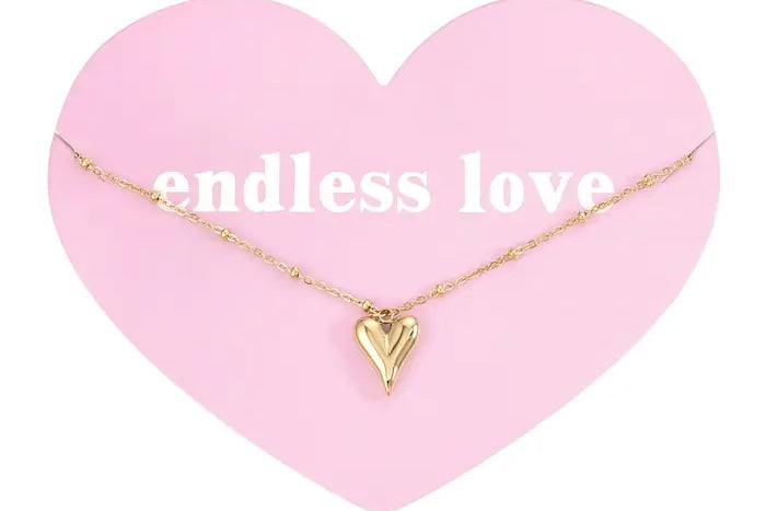 Bolletjes ketting met iconisch hart Goud