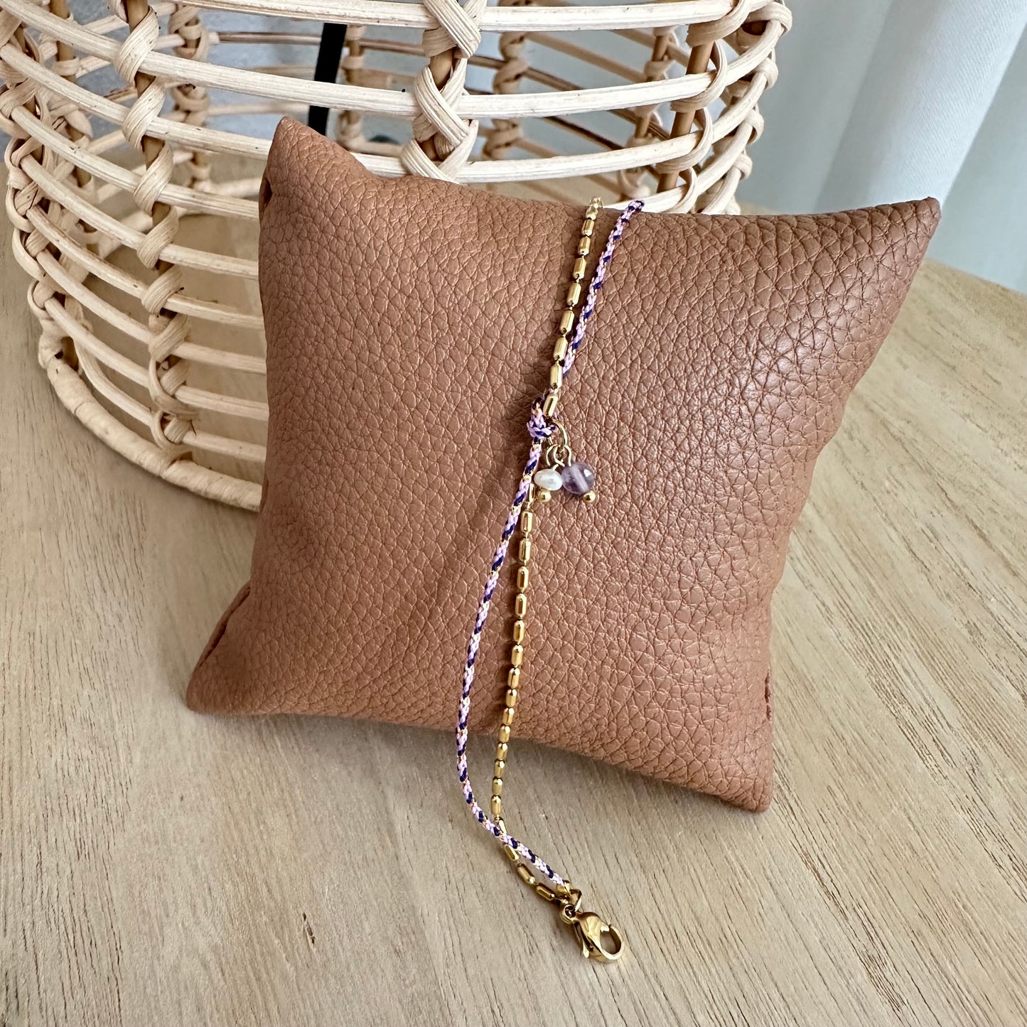Armbandje met twee bandjes goud/touw