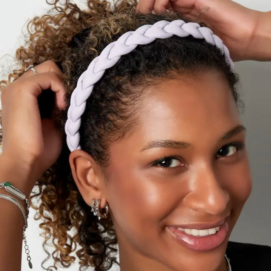 Gevlochten haarband oranje