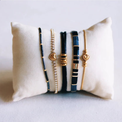 Satijn armbandje met ringen Zwart/Goud