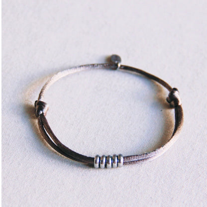 Satijn armbandje met ringen Taupe/zilver