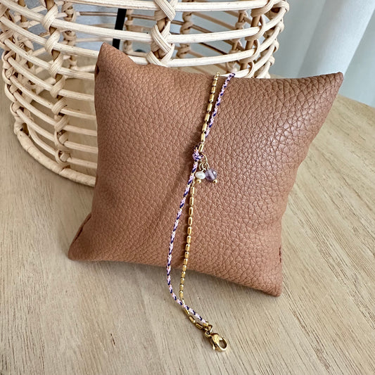 Armbandje met twee bandjes goud/touw