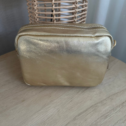 Lederen crossbody tas Goud ‘Tassel’ met gouden ritsje