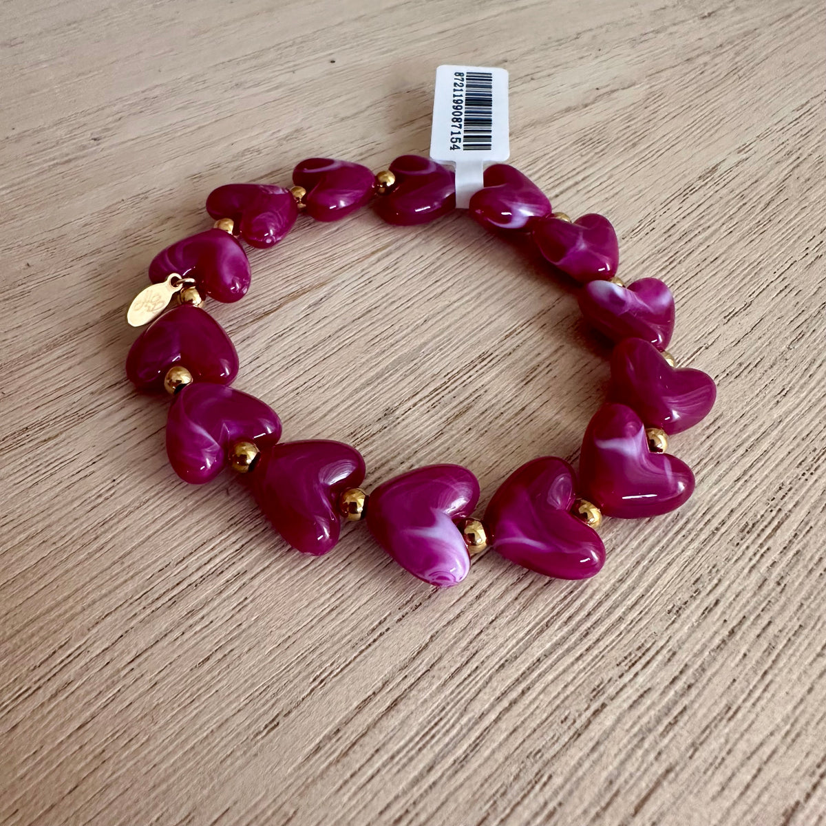 Kralenarmband hartjes Fuchsia