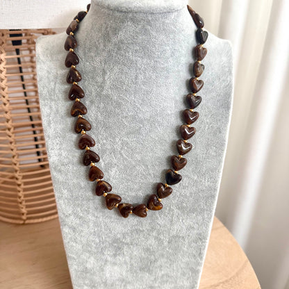 Elastieken hartjes armband Bruin
