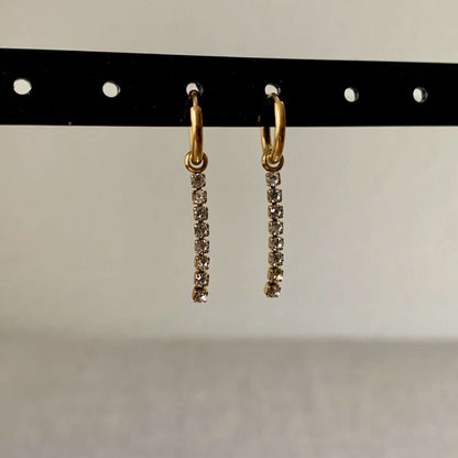 Oorringen Goud met koordjes van kleine strass steentjes