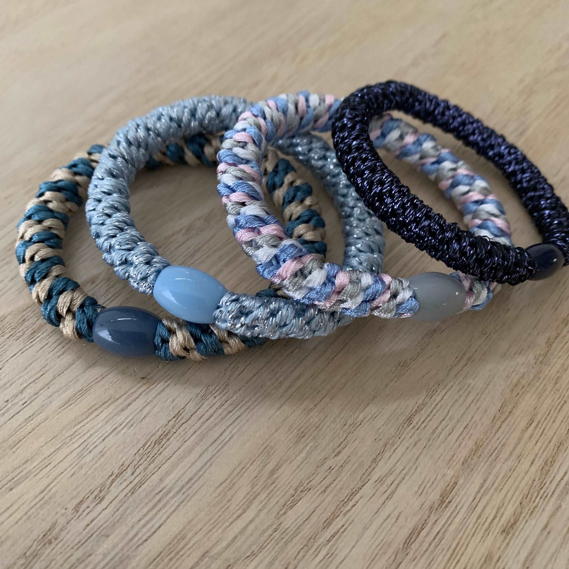 Setje van 4 haarelastiekjes/armbandjes Blauw