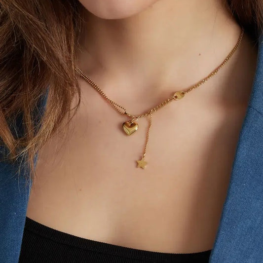 Ketting met hart en ster bedel Goud