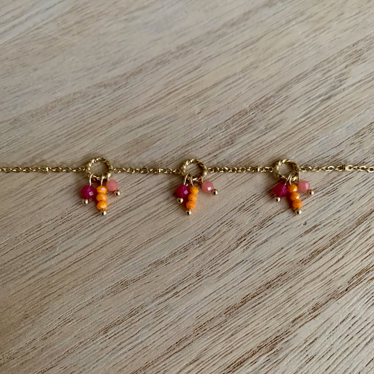 Armbandje kleurrijke fiësta- Oranje-Roze-Goud