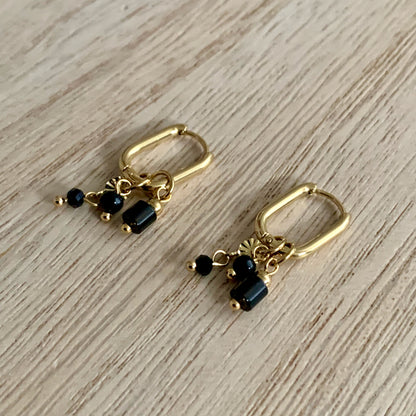 Oorbel met zwarte kralen Goud
